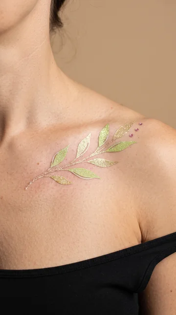 Rama de hojas verdes y doradas con glitter